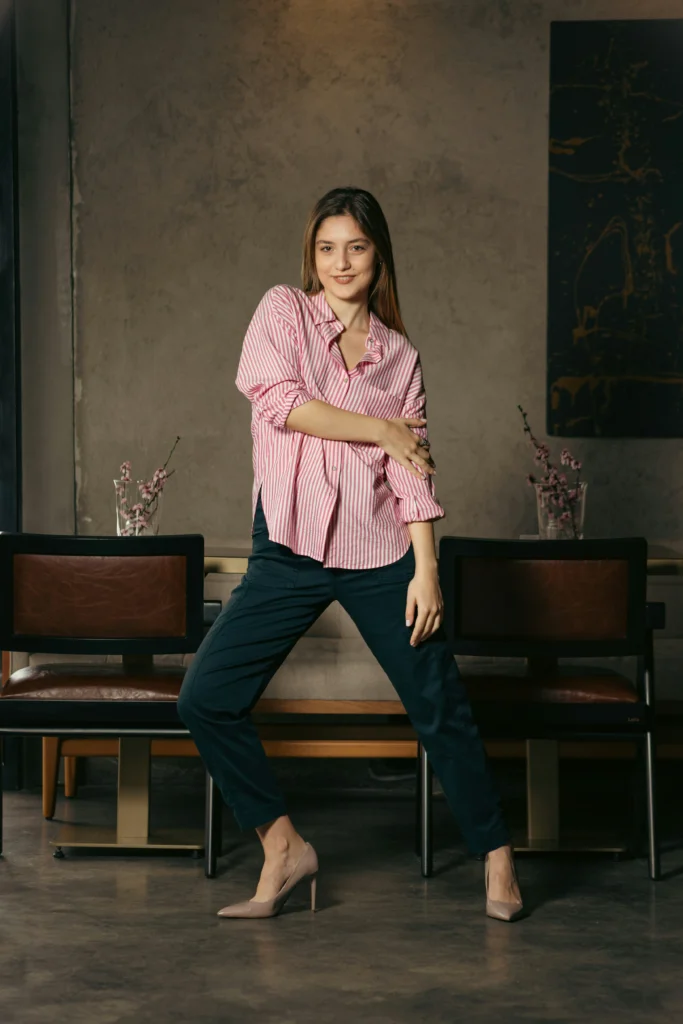 This cowl neck satin dress in a gorgeous emerald green is pure glamour! It hugs in all the right places, making it a perfect pick for a cocktail party or a fancy dinner. Keep the accessories delicate, like this layered necklace, to let the dress really shine. It’s elegant, confident, and absolutely stunning—a total showstopper!