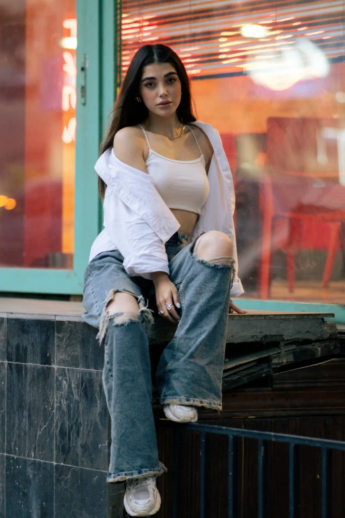 This cowl neck satin dress in a gorgeous emerald green is pure glamour! It hugs in all the right places, making it a perfect pick for a cocktail party or a fancy dinner. Keep the accessories delicate, like this layered necklace, to let the dress really shine. It’s elegant, confident, and absolutely stunning—a total showstopper!